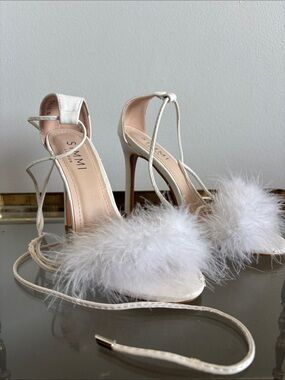 🤍 white strappy feather heels
